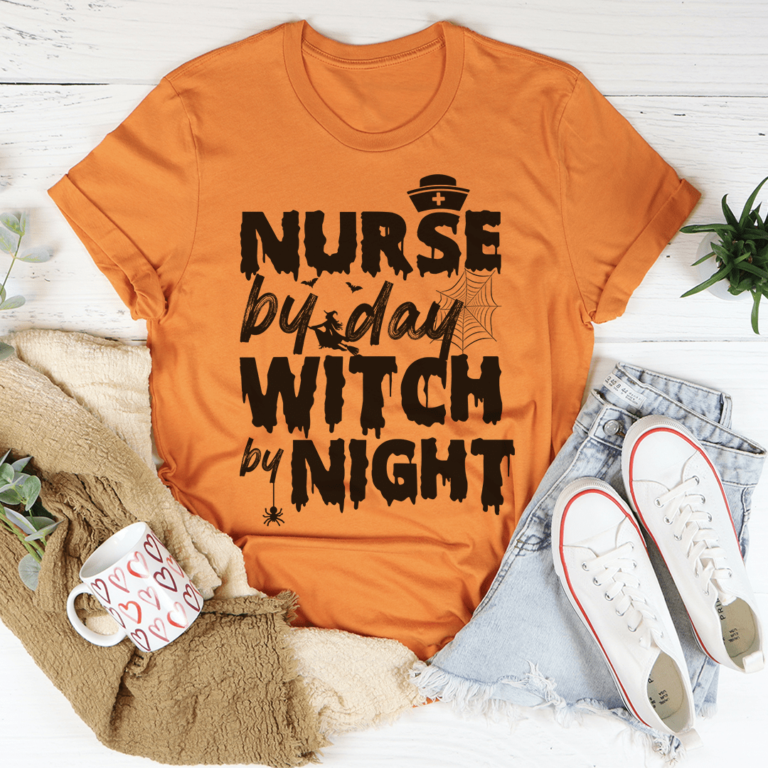 Orange crewneck T-shirt with black Nurse by Day Witch by Night lettering graphic