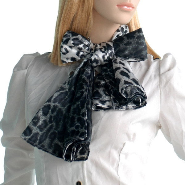 Leopard-print silk scarf tied at the neck, black-and-white with bow detail