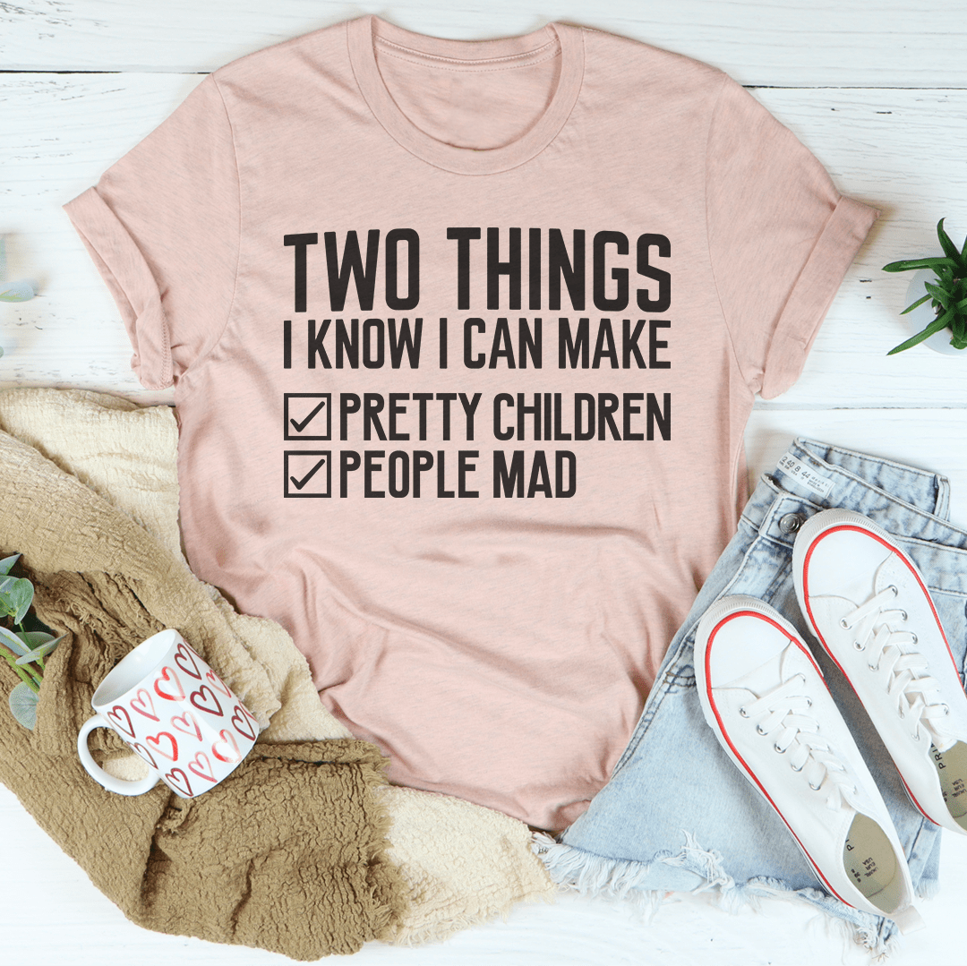 Light pink T-shirt with dark text: TWO THINGS I KNOW I CAN MAKE and checkmarked lines