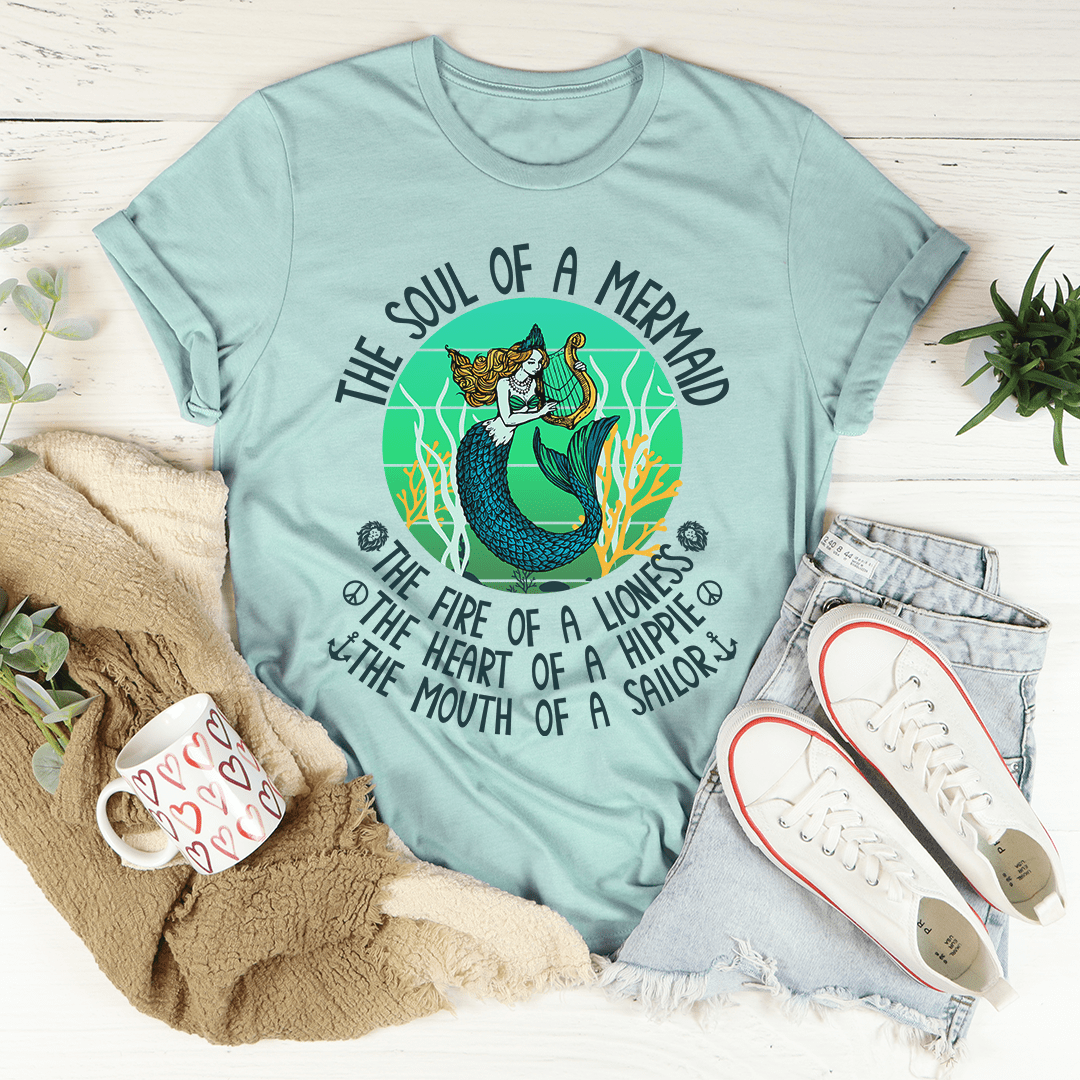 Seafoam teal mermaid graphic t-shirt with circular text and teal fish-tail illustration