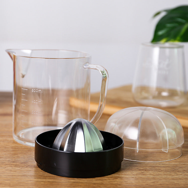 Citrus juicer pitcher set: clear pitcher, black strainer base, and clear dome cover