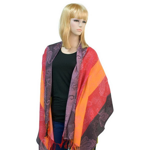 Paisley pashmina shawl draped on shoulders, purple with pink and orange blocks