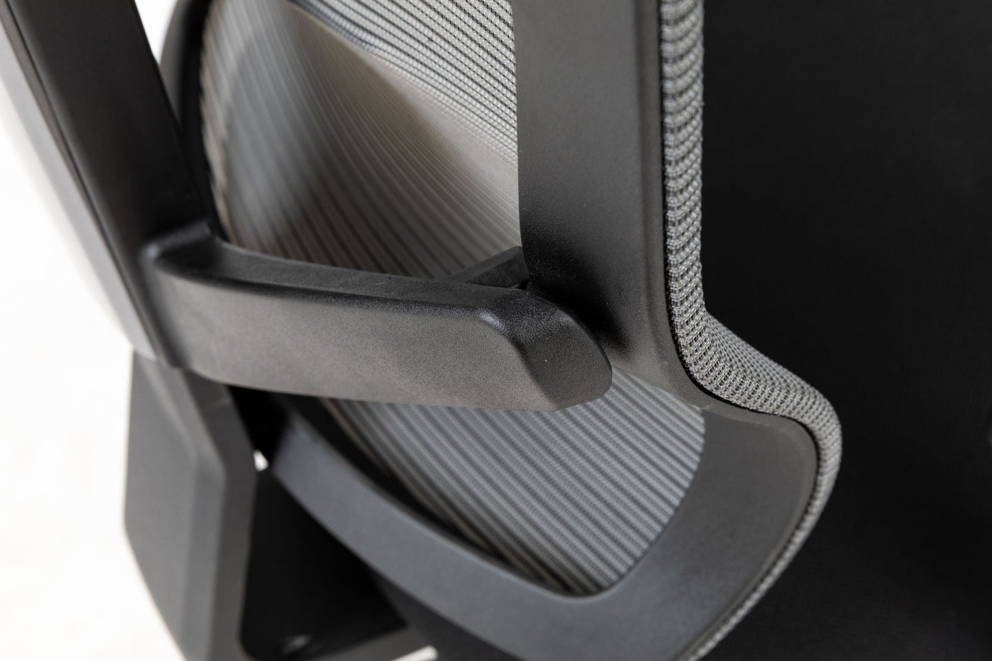 Office chair armrest and lower back support with curved padded panel