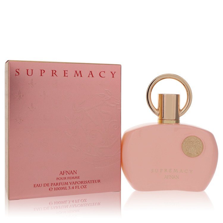 Pink eau de parfum bottle with gold cap and ring, shown with matching box
