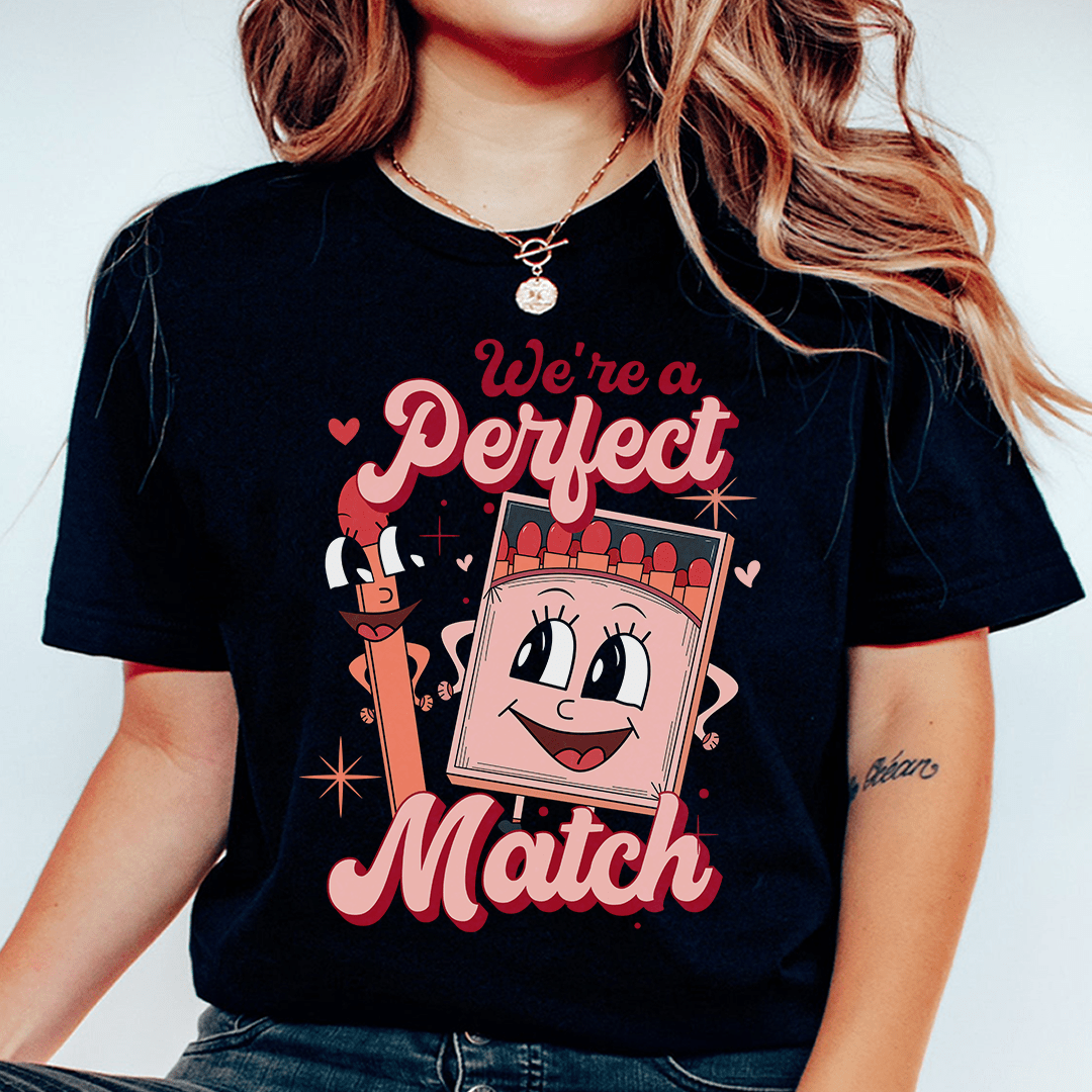 Black heather graphic T-shirt with cartoon “Perfect Match” heart print