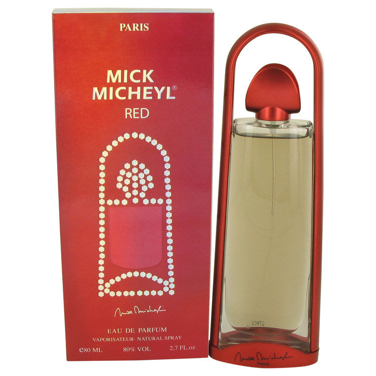 Red eau de parfum spray bottle with red cap and matching red product box