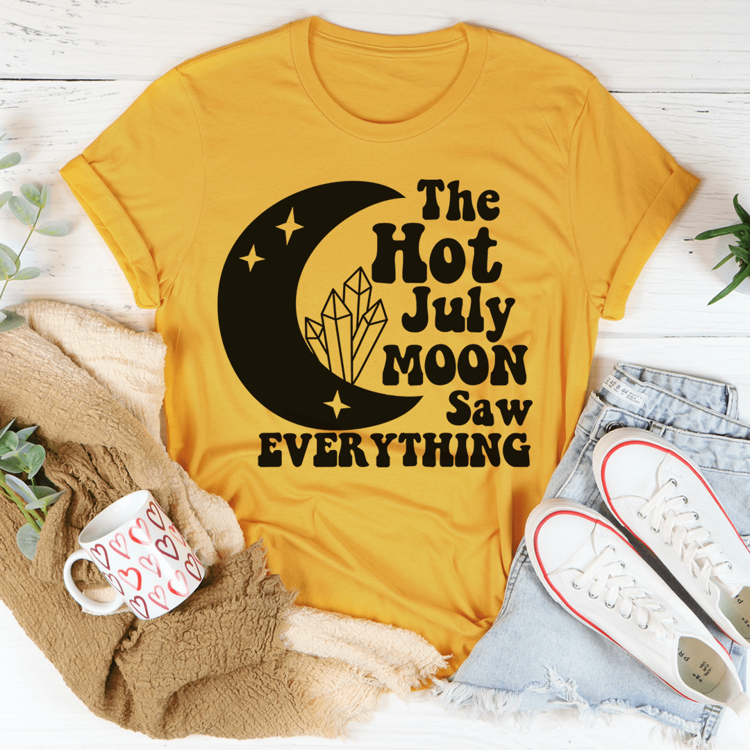 Mustard yellow T-shirt with black moon graphic and “Hot July Moon Saw Everything”