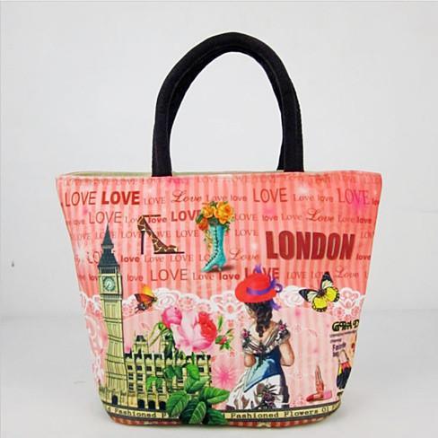 Canvas tote with pink base, black carry handles, and “LOVE” and “LONDON” print