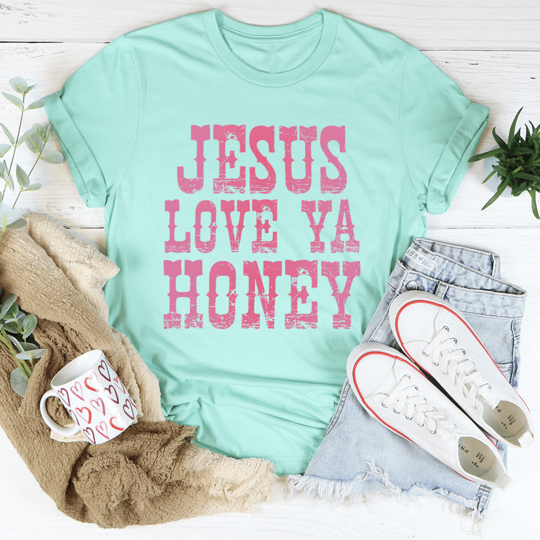 Mint green crewneck T-shirt with pink 'JESUS LOVE YA HONEY' graphic