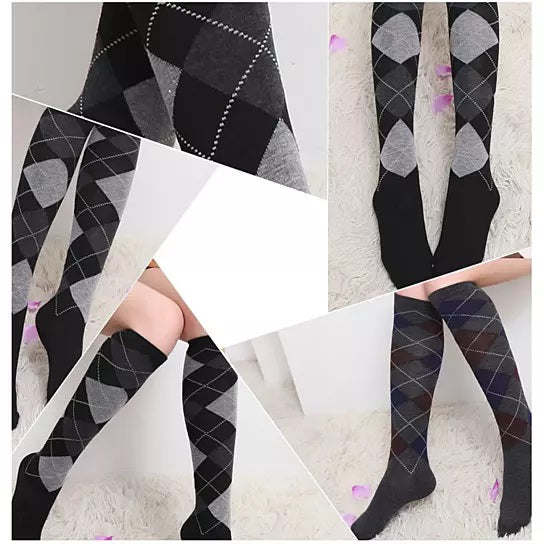 Compression long socks, dark argyle diamond pattern, close-up of calves