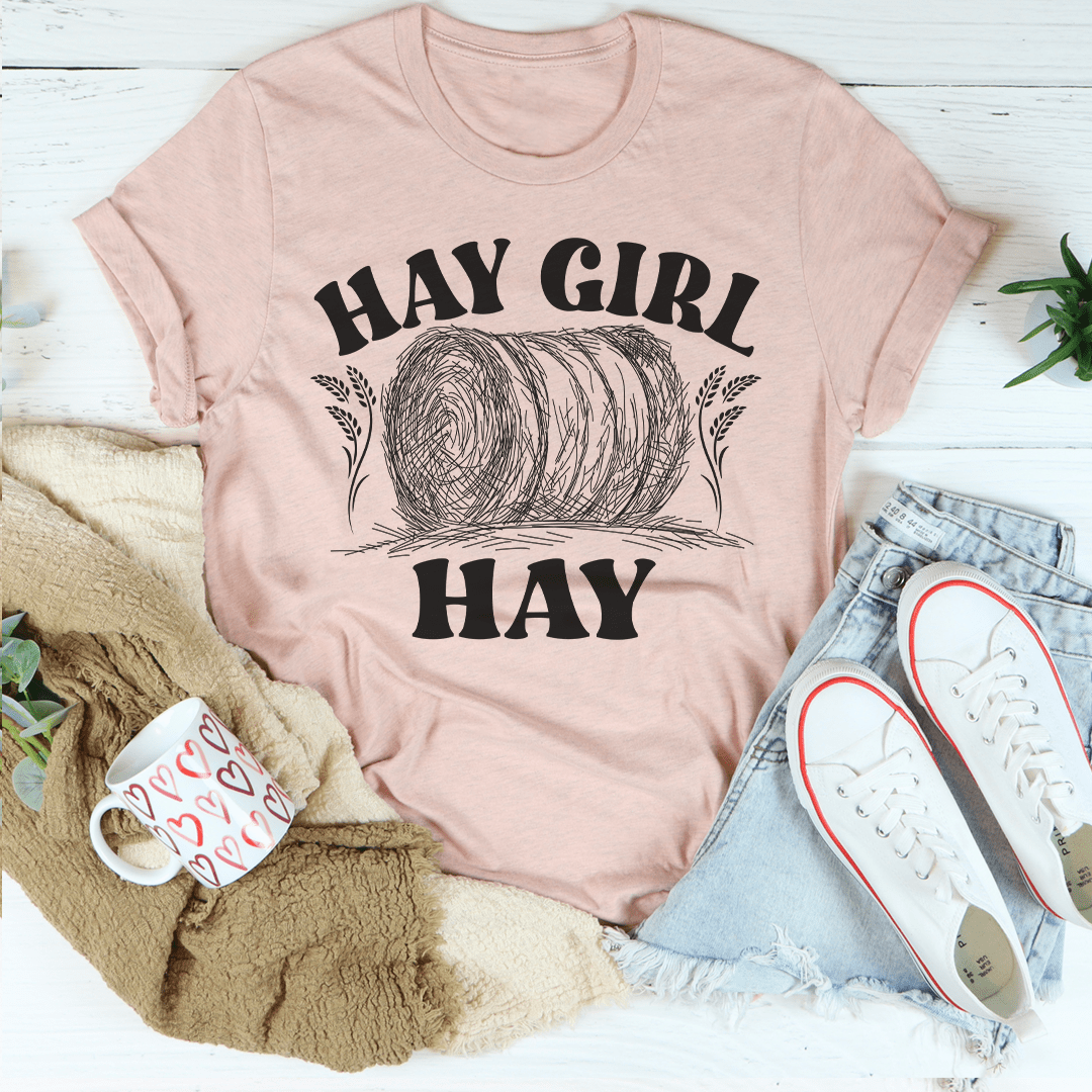 Mauve crewneck graphic tee with “HAY GIRL” and “HAY” lettering
