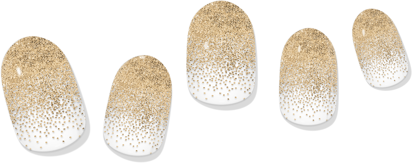 Gold-dusted gel nail wraps with glitter gradient tips on white base, five nails