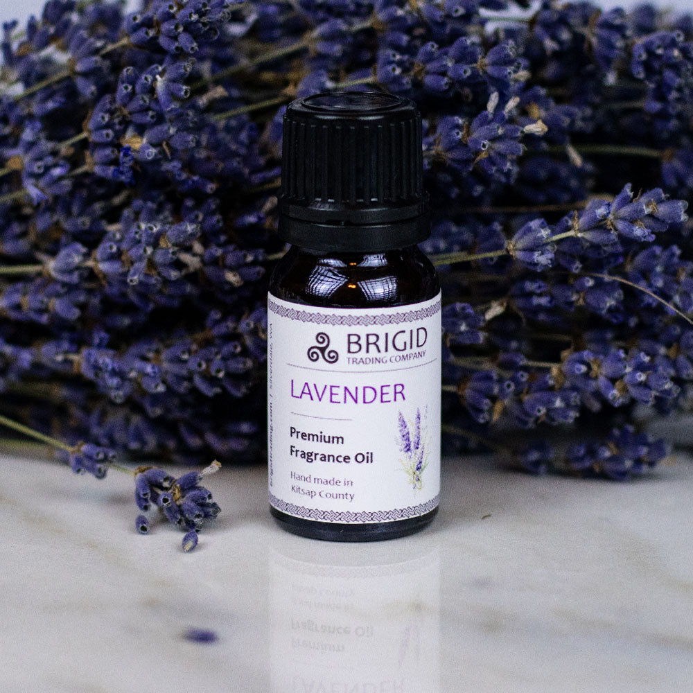 Lavender essential fragrance oil bottle with black cap and white label