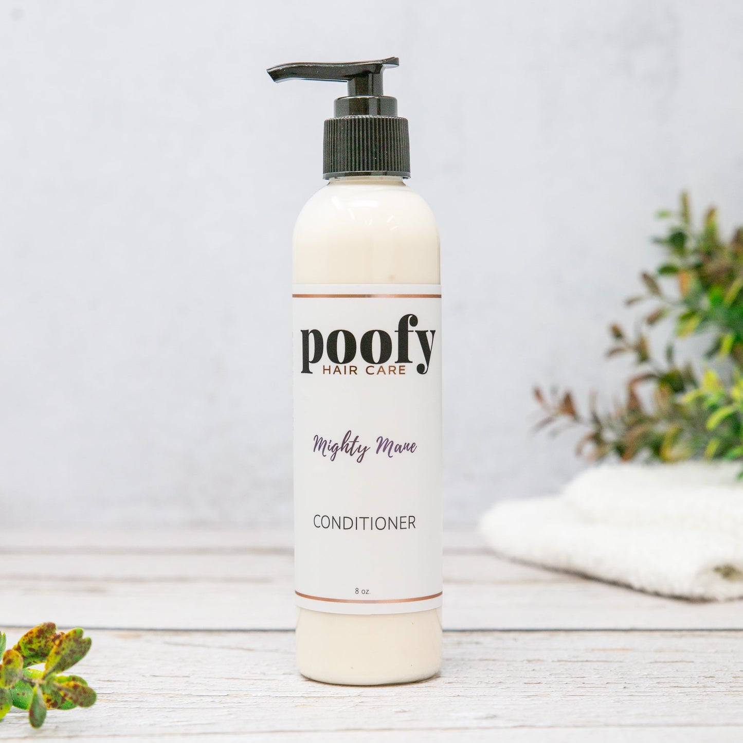 Mighty Mane conditioner by poofy, pump-top cream bottle with label text