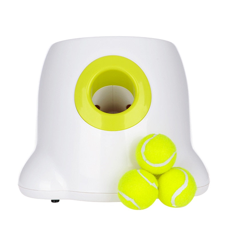White and lime dog tennis ball launcher base with circular chute and tennis balls