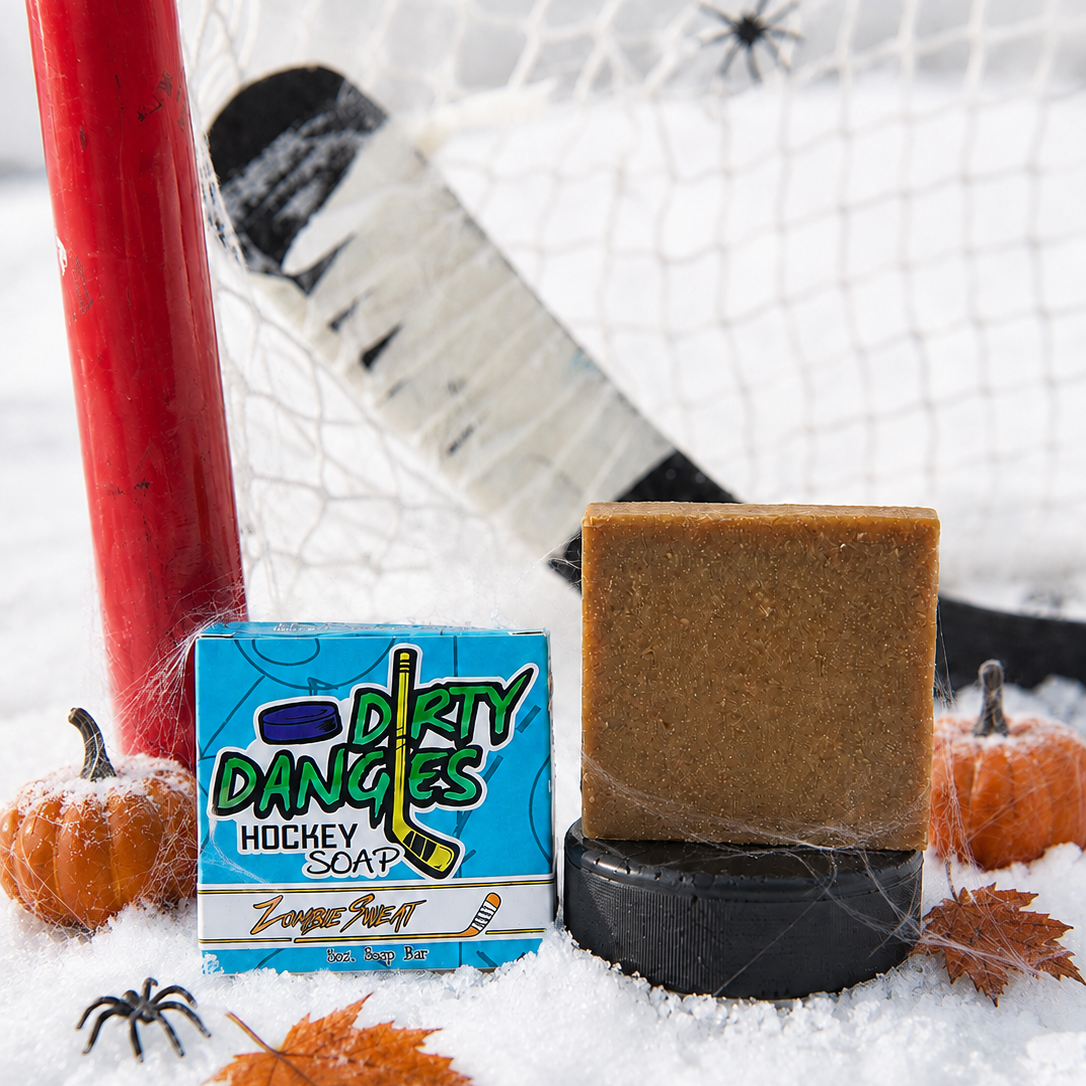 Dirty Dangles hockey soap bar with brown bar and blue Dirty Dangles box packaging