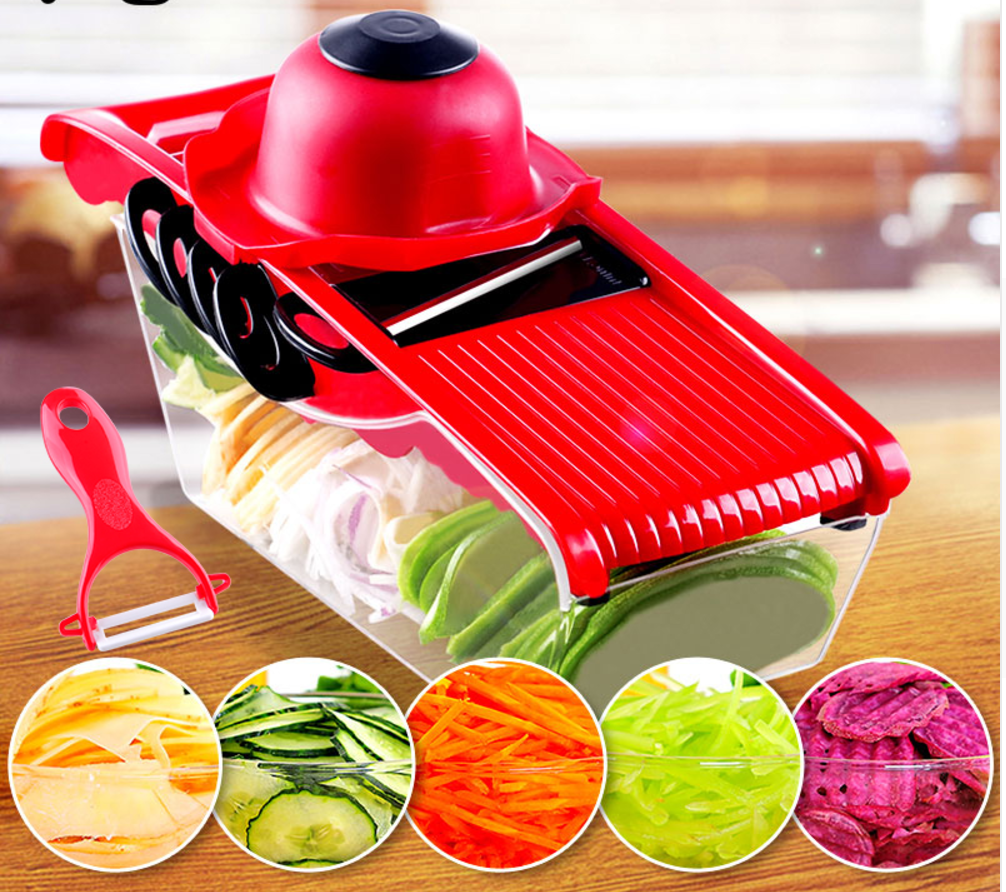 Red vegetable slicer with blade window and clear container, with colorful veggie slice samples.