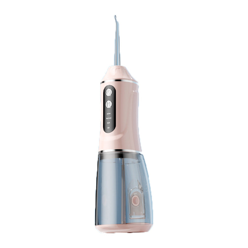 Portable electric dental flosser in pink with clear water reservoir and jet tip
