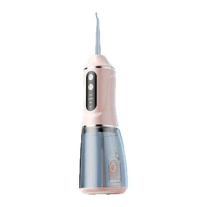 Portable electric dental flosser in pink with clear water reservoir and jet tip