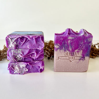 Lavender harvest goat milk soap bar, purple with glittered speckles and rosette swirl