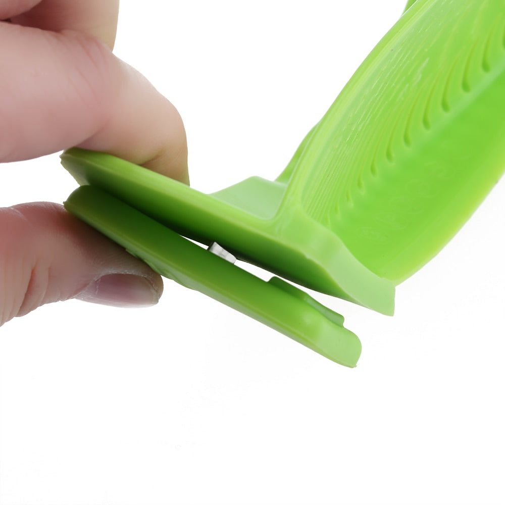 Green silicone snap strainer handle with locking tabs