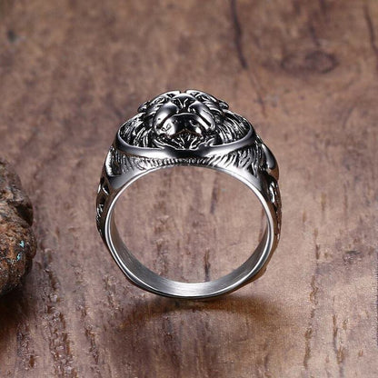 Lion head ring, silver-tone metal, side view of band with raised lion head