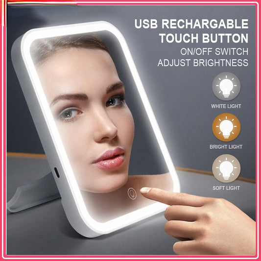 White makeup mirror with glowing LED light frame and touch control button
