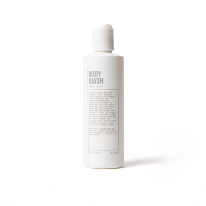 Conditioner bottle with pump, back label visible on white bottle