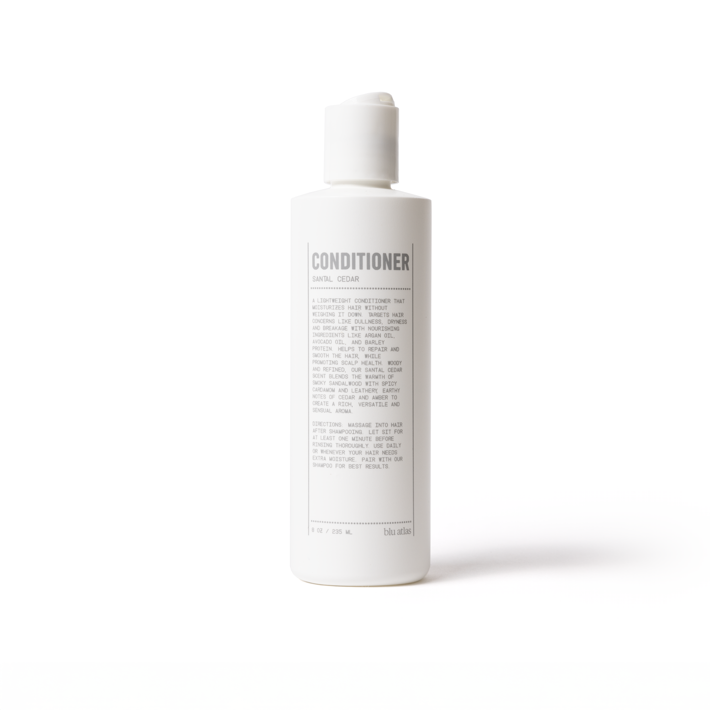 Conditioner bottle with pump, label on back visible