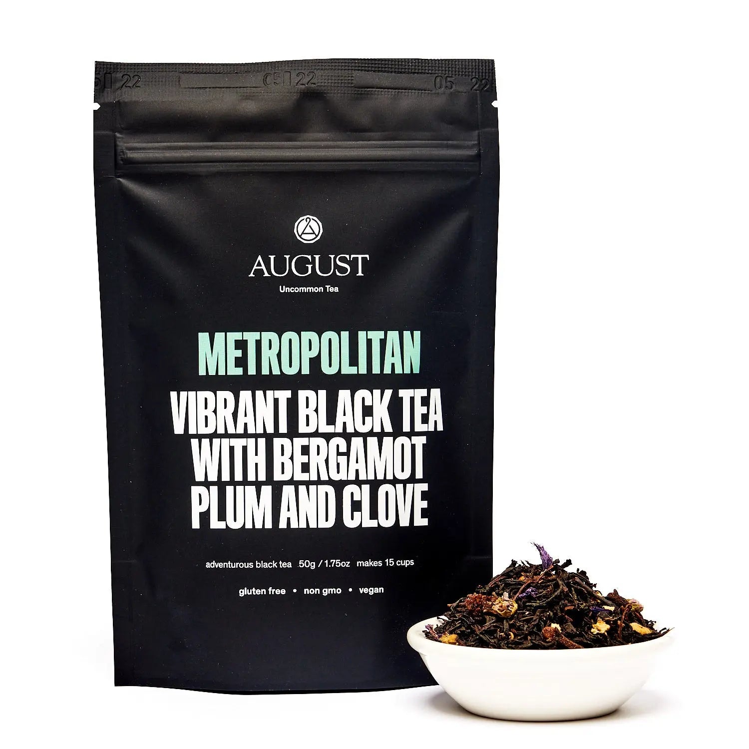 Black Metropolitan black tea pouch with tea leaves in a small bowl