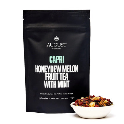 Black tea pouch for Capri honeydew melon fruit tea with mint, by August.