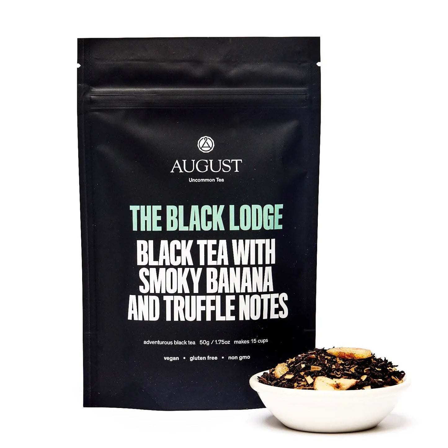 Black tea pouch labeled The Black Lodge with smoky banana and truffle notes