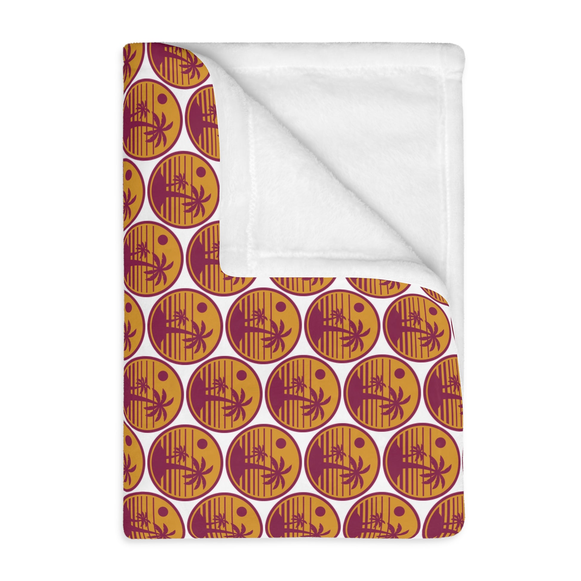 Velveteen throw blanket with orange-and-burgundy pumpkin circle pattern