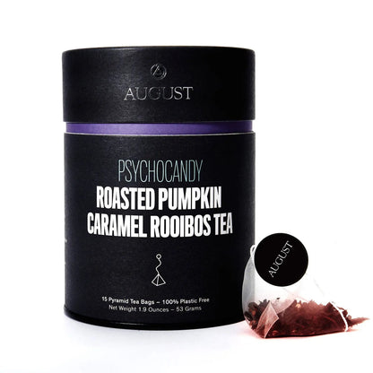 Black tea tin with purple band and roasted pumpkin caramel rooibos tea label
