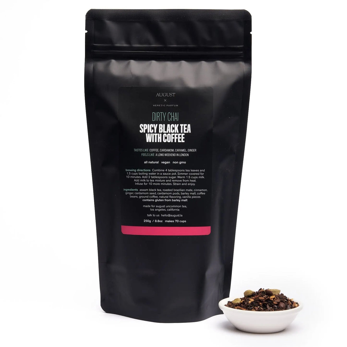 Black stand-up tea pouch with small bowl of dark tea leaves and coffee blend
