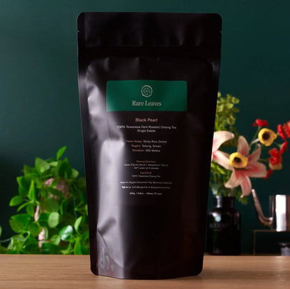 Black Pearl oolong tea pouch with green label panel