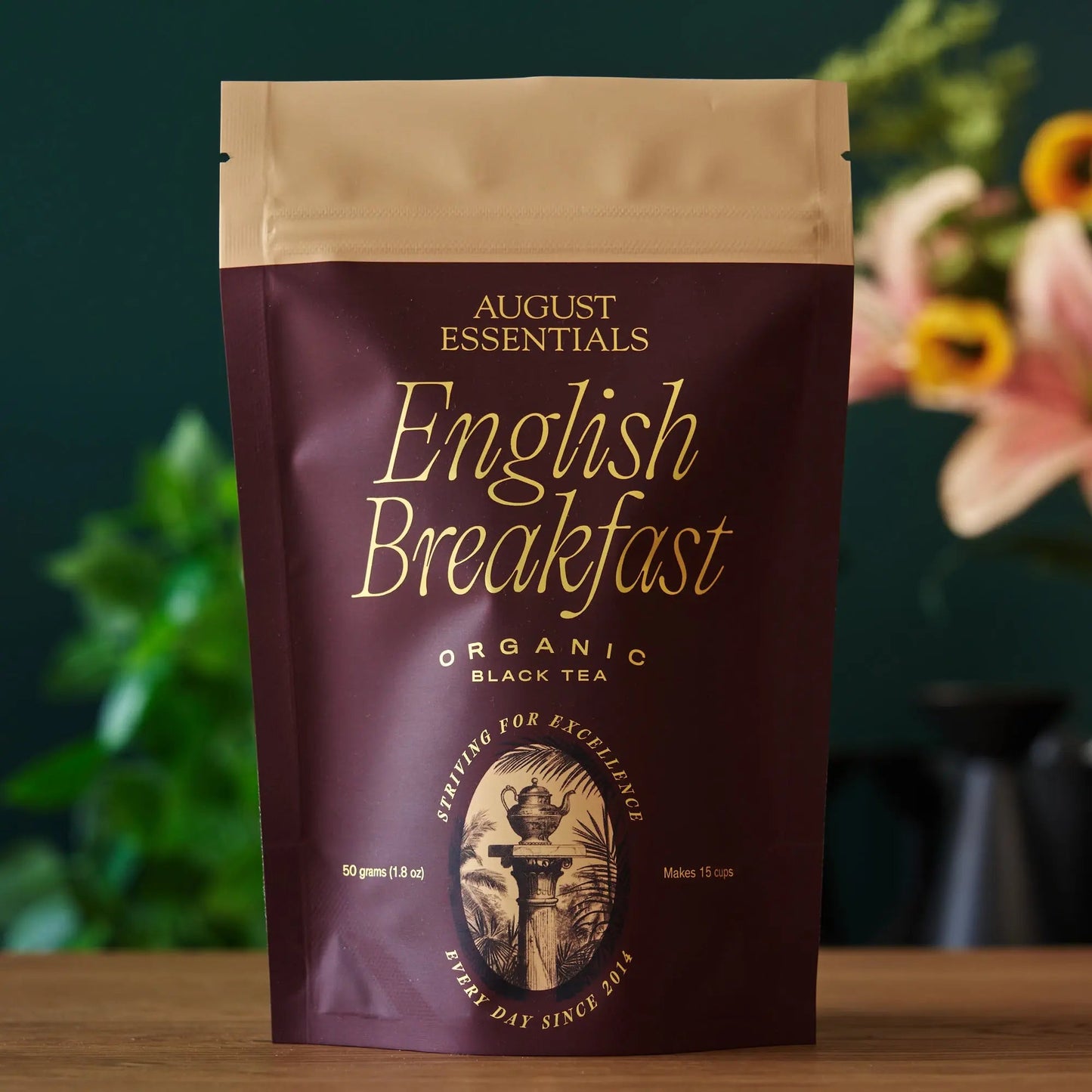 August Essentials English Breakfast black tea pouch, organic black tea, maroon front bag