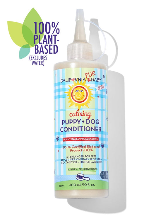 Calming™ Puppy + Dog Conditioner bottle with label front and squeeze nozzle