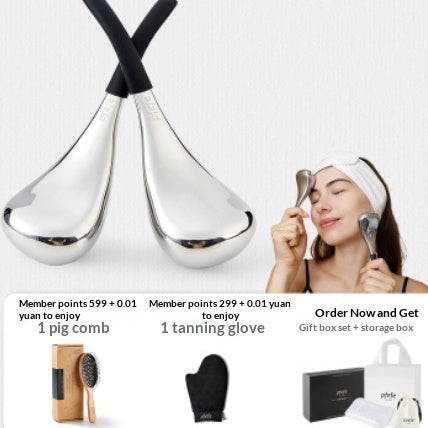 Silver double ice spoon facial massage device with black cord and eye pad set
