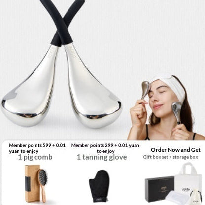 Silver double ice spoon facial massage device, corded handles, eye cooling pad