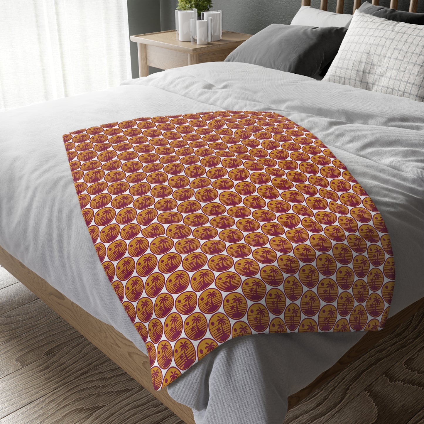 Velveteen throw blanket featuring repeating orange pumpkin circle pattern