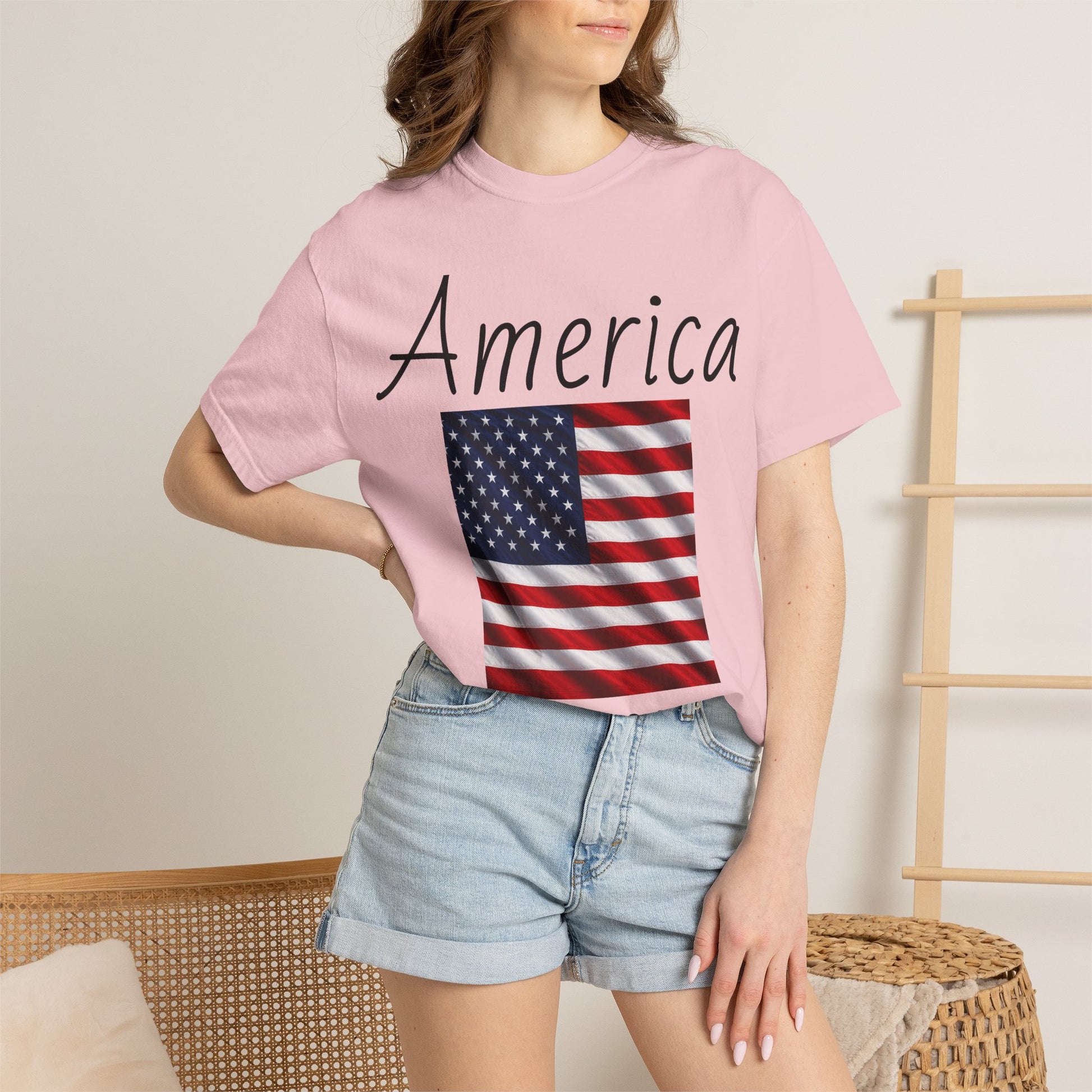 Lavender unisex T-shirt with large 'America' script and US flag graphic