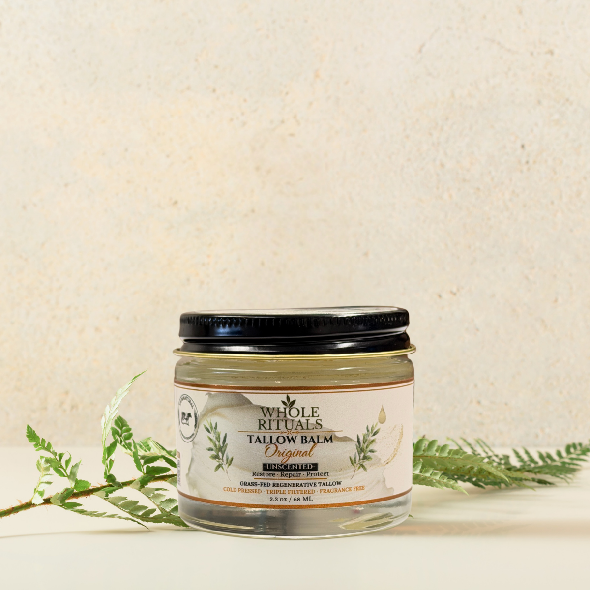 Unscented Original tallow balm jar with black lid and green herb sprigs