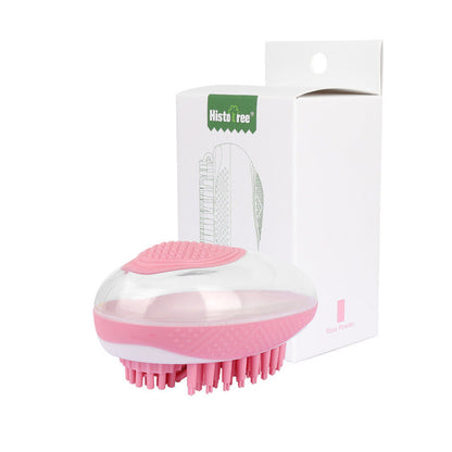 Pink pet bath brush with silicone bristle pad, packaged in retail box
