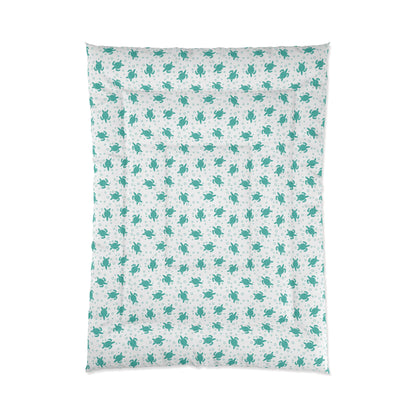 Comforter with teal all-over floral pattern on white fabric