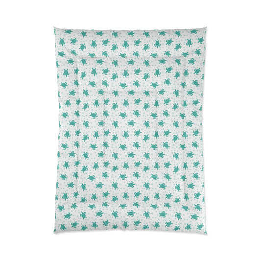 Comforter with teal all-over floral pattern on white fabric