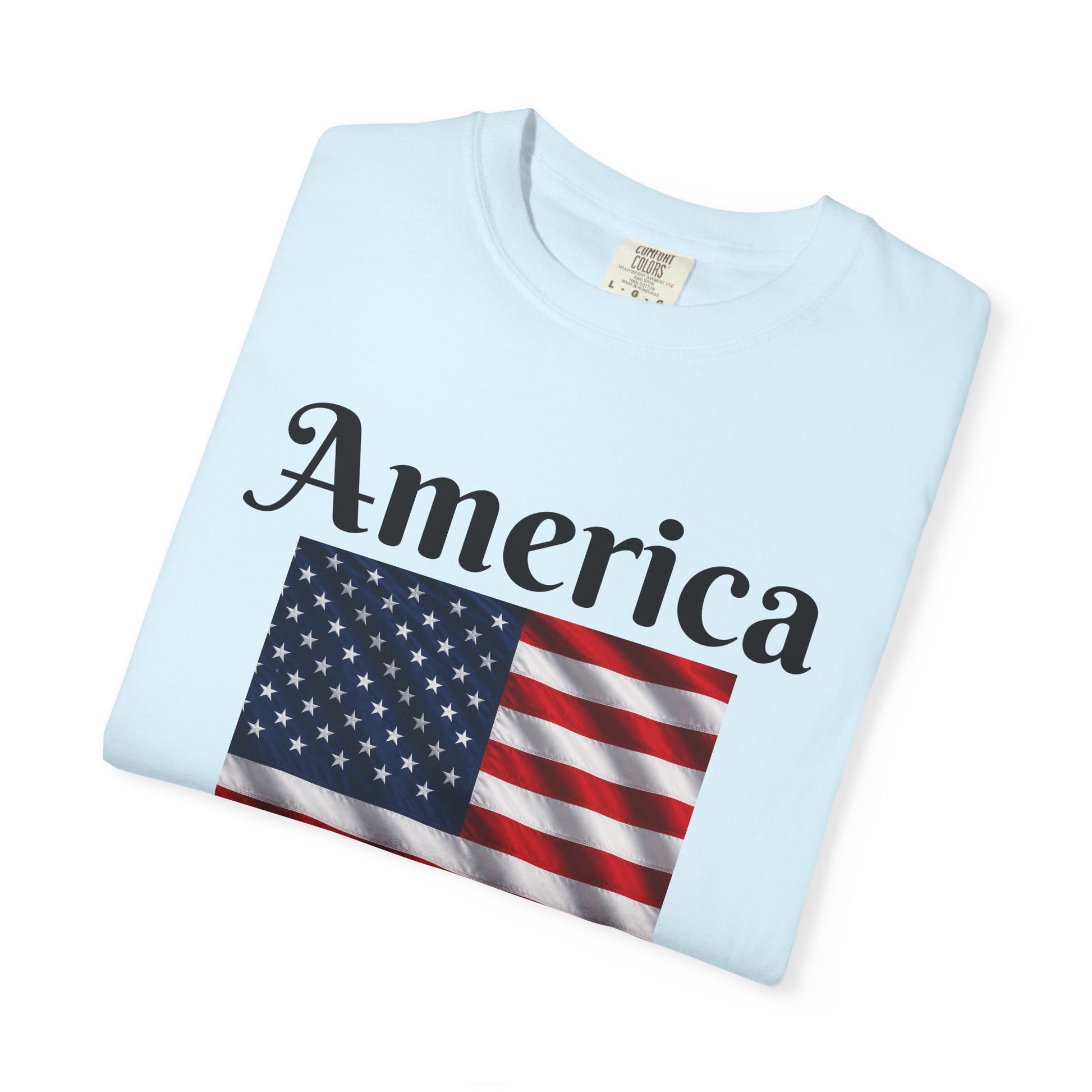 Light blue T-shirt with front America script and U.S. flag graphic