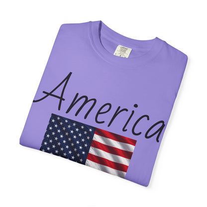 Unisex T-shirt, lavender purple, “America” text over U.S. flag graphic on front