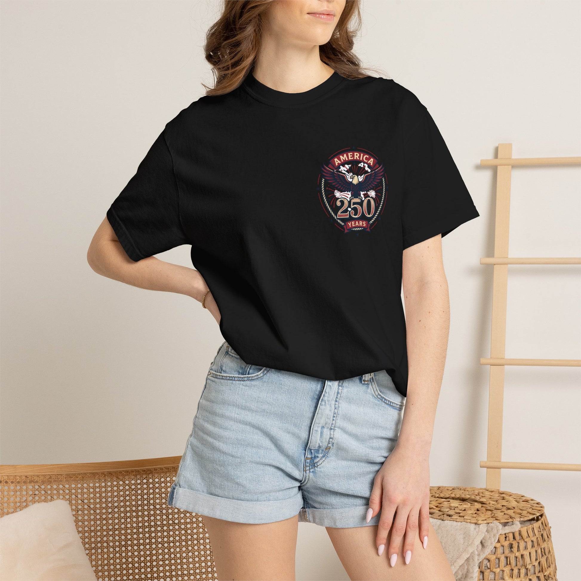 Black T-shirt with America 250 Years eagle emblem, worn by model