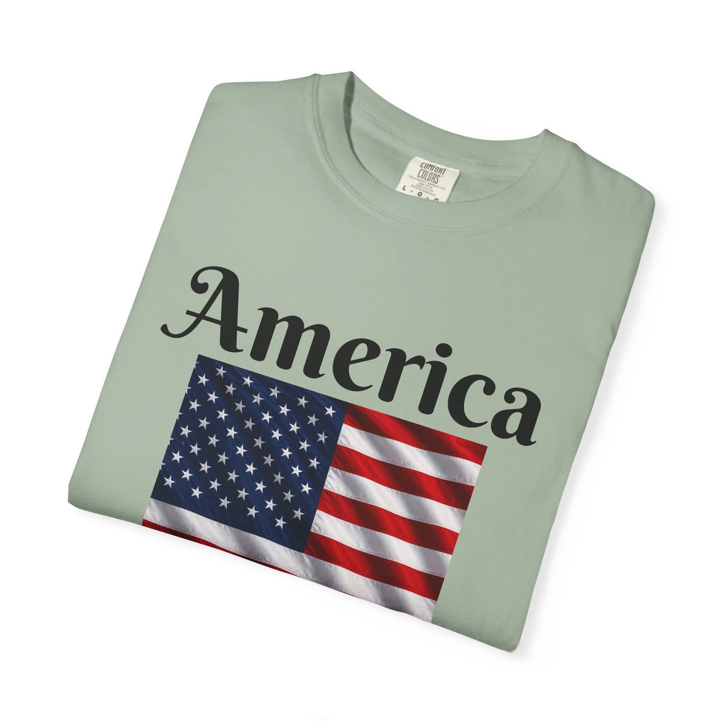Light green T-shirt with America script over U.S. flag graphic